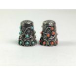 TWO SILVER THIMBLES,