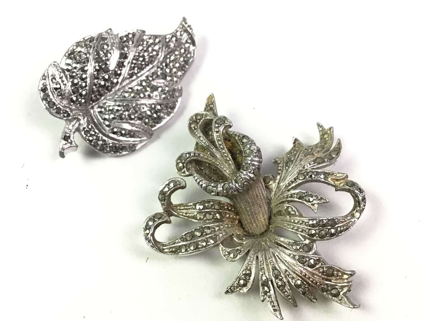 TWO MARCASITE BROOCHES, AND ANOTHER