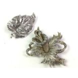 TWO MARCASITE BROOCHES, AND ANOTHER