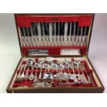 OAK CANTEEN OF SILVER PLATED CUTLERY,