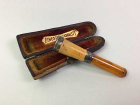 SILVER AND AMBER CIGARETTE HOLDER,