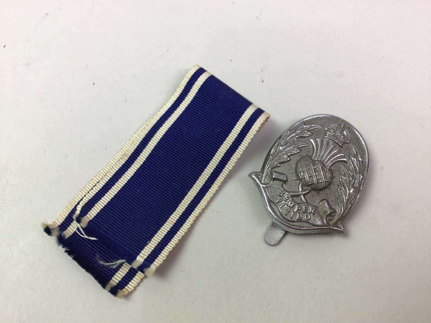 GEORGE VI FOR EXEMPLARY POLICE SERVICE MEDAL, ALONG WITH A POLICE CAP BADGE - Image 2 of 3