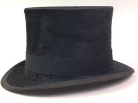 BLACK TOP HAT IN LEATHER CASE, AND A BOWLER HAT