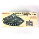 RADIO SHACK REMOTE CONTROL TANK, AND AN ACTION MAN TRAINING TOWER