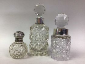 THREE SILVER MOUNTED CRYSTAL PERFUME BOTTLES, VICTORIAN AND LATER