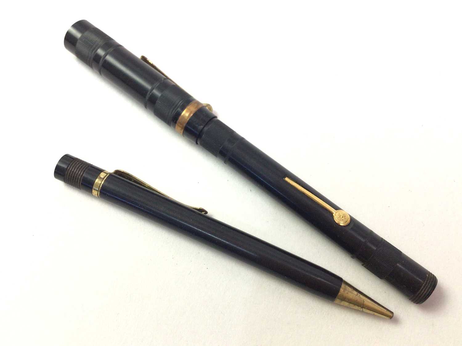 FOURTEEN CARAT GOLD NIBBED FOUNTAIN PEN, AND A PROPELLING PENCIL