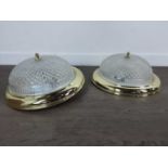 PAIR OF BRASS EFFECT CIRCULAR LIGHT FITTINGS, ALONG WITH A WALL LIGHT