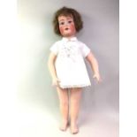 GERMAN BISQUE HEADED DOLL,