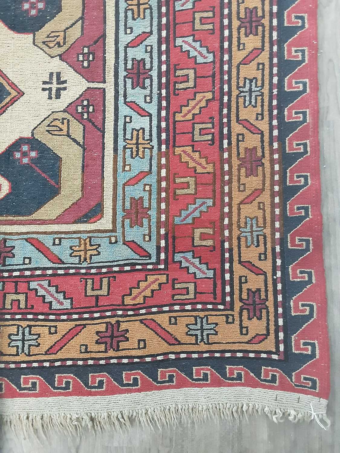 RUSSIAN CAUCASIAN BORDERED RUG,