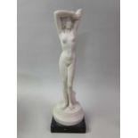 COMPOSITE FIGURE OF A NUDE FEMALE, AND OTHER CERAMICS