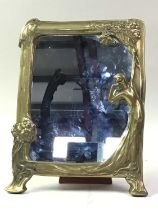 ART NOUVEAU STYLE BRASS TABLE MIRROR, AND A PHOTOGRAPH FRAME