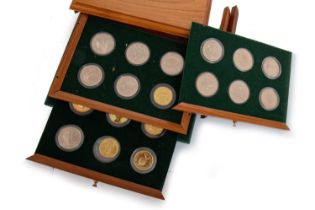 CASED COLLECTION OF GOLD AND SILVER COINS,