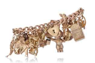 CHARM BRACELET, IN NINE CARAT GOLD