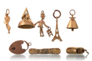 COLLECTION OF GOLD CHARMS,