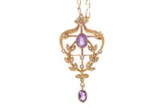 AMETHYST AND SEED PEARL HOLBEIN PENDANT,