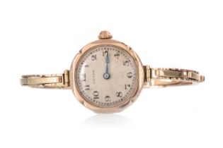 MENEX NINE CARAT GOLD WRIST WATCH,