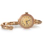 NINE CARAT GOLD CASED WRIST WATCH,