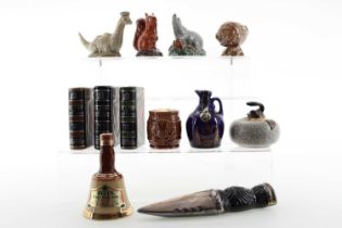 12 CERAMIC WHISKY MINIATURES INCLUDING BENEAGLES NESSIE AND HAGGIS