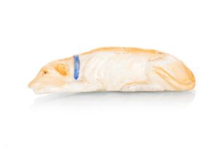 CONTINENTAL PORCELAIN FIGURE OF A RECUMBENT GREYHOUND 19TH CENTURY