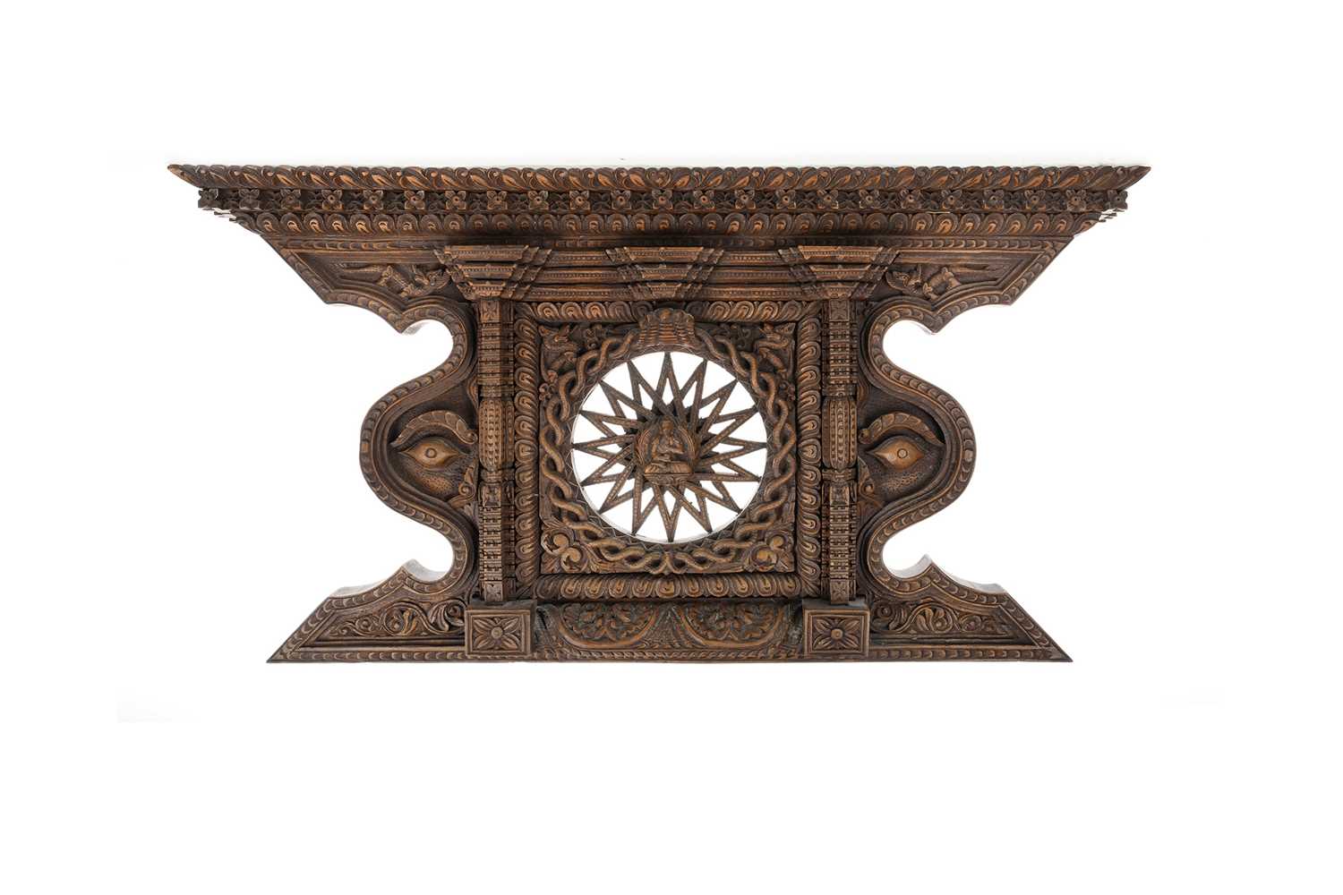 NEPALESE BUDDHIST CARVED HARDWOOD PEDIMENT, EARLY-MID 20TH CENTURY