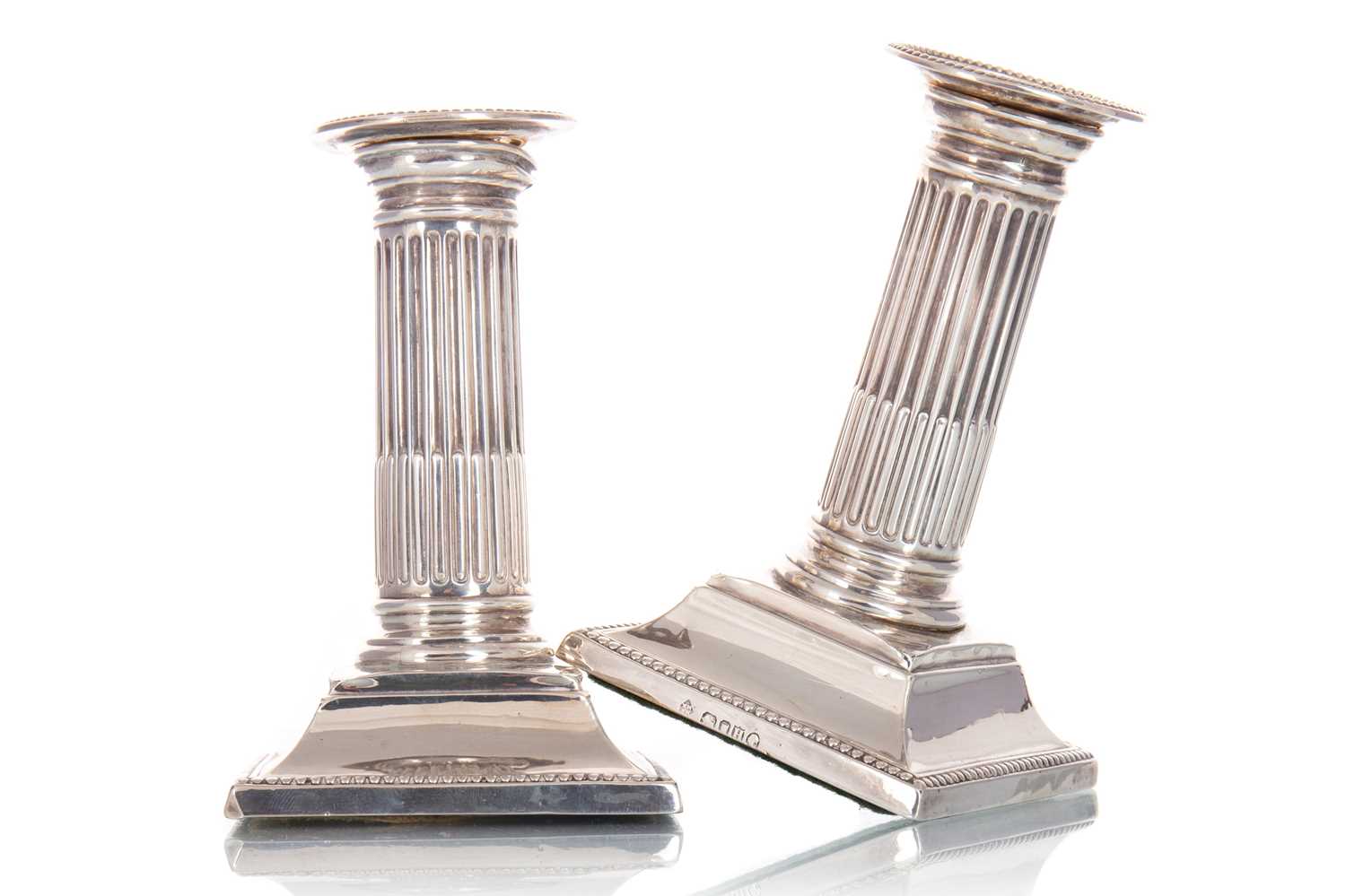 PAIR OF SILVER COLUMN CANDLESTICKS, KMLH, LONDON 1883