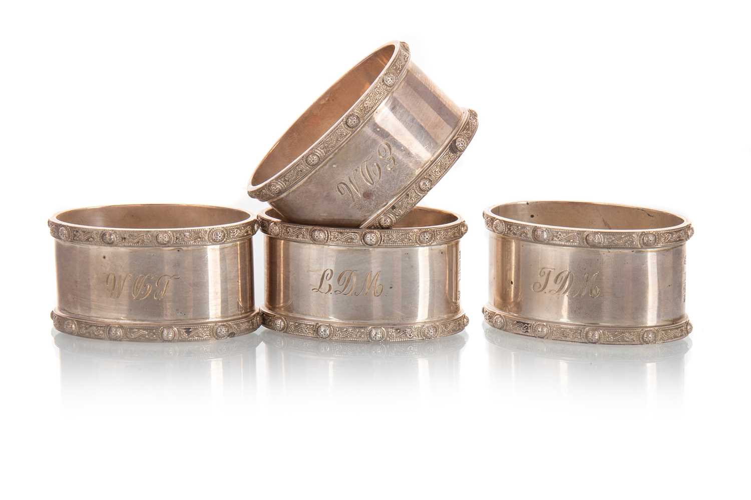 SET OF FOUR SILVER NAPKIN RINGS G.B.C. & S., BIRMINGHAM MARKS