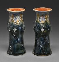 A pair of Doulton Ware vases, early 20th c, applied with spiral beading, 15cm h, impressed marks and