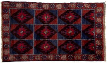 A Persian Baluch rug, 134 x 80cm