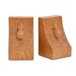 A pair of Mouseman oak book ends, 15cm h, carved mouse 'signature' Good condition