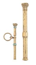 A Victorian split turquoise and gold lady's propelling pencil and a larger contemporary gold-sleeved