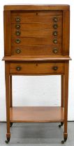 A serpentine mahogany and crossbanded canteen on stand, Walker & Hall Ltd, Sheffield, 116cm h; 42