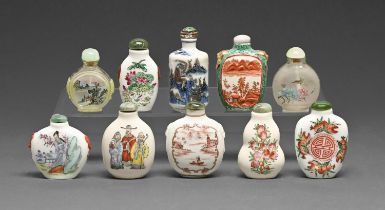 Ten Chinese glass and porcelain snuff bottles, 20th c, including a blue and white cylindrical