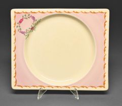 Clarice Cliff. An Aurora Rose Biarritz plate, 1936, 19 x 23cm, printed marks One or two very small