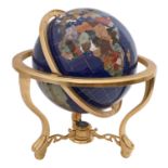 A terrestrial mineral globe, in giltmetal tripod stand, 49cm h x 42cm diam Good condition