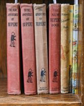 Children's Books. Seven Rupert Annuals, including the first, The New Adventures of Rupert, 1936,