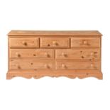 A waxed pine chest of drawers, 75cm h; 152 x 45cm