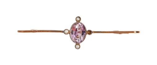 An amethyst and seed pearl bar brooch, early 20th c, in gold, 61mm l, marked 15ct, 3.7g Lacks one