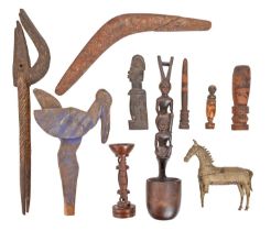 Tribal art. A quantity of African wooden and other carvings, etc, including a Benin style bronze