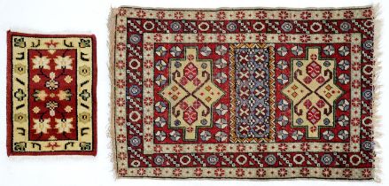 An Antique Turkish rug and an Indian mat, 120 x 84cm and 58 x 41cm (2)