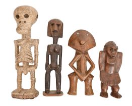 Tribal art. Central Africa - a Luba carved wood skeleton figure, 40cm h, a Kumu carved wood figure