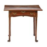 A George II walnut side table, with shaped apron, on turned legs and pad feet, 72cm h; 49 x 78cm Old