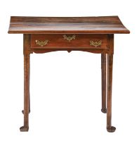 A George II walnut side table, with shaped apron, on turned legs and pad feet, 72cm h; 49 x 78cm Old