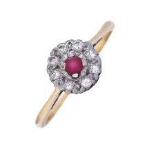 A ruby and diamond cluster ring, gold hoop marked 18ct PLAT, 2.5g, size P Rubies abraded from wear