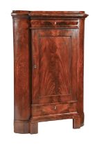 A French mahogany standing corner cupboard, 19th c, with panelled door and mother of pearl