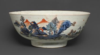 A Chinese blue and white punch bowl with 'clobbered' decoration, late 18th c, painted with