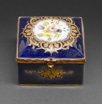 A Continental porcelain box, painted with flowers in raised gilt surround, on a cobalt ground,