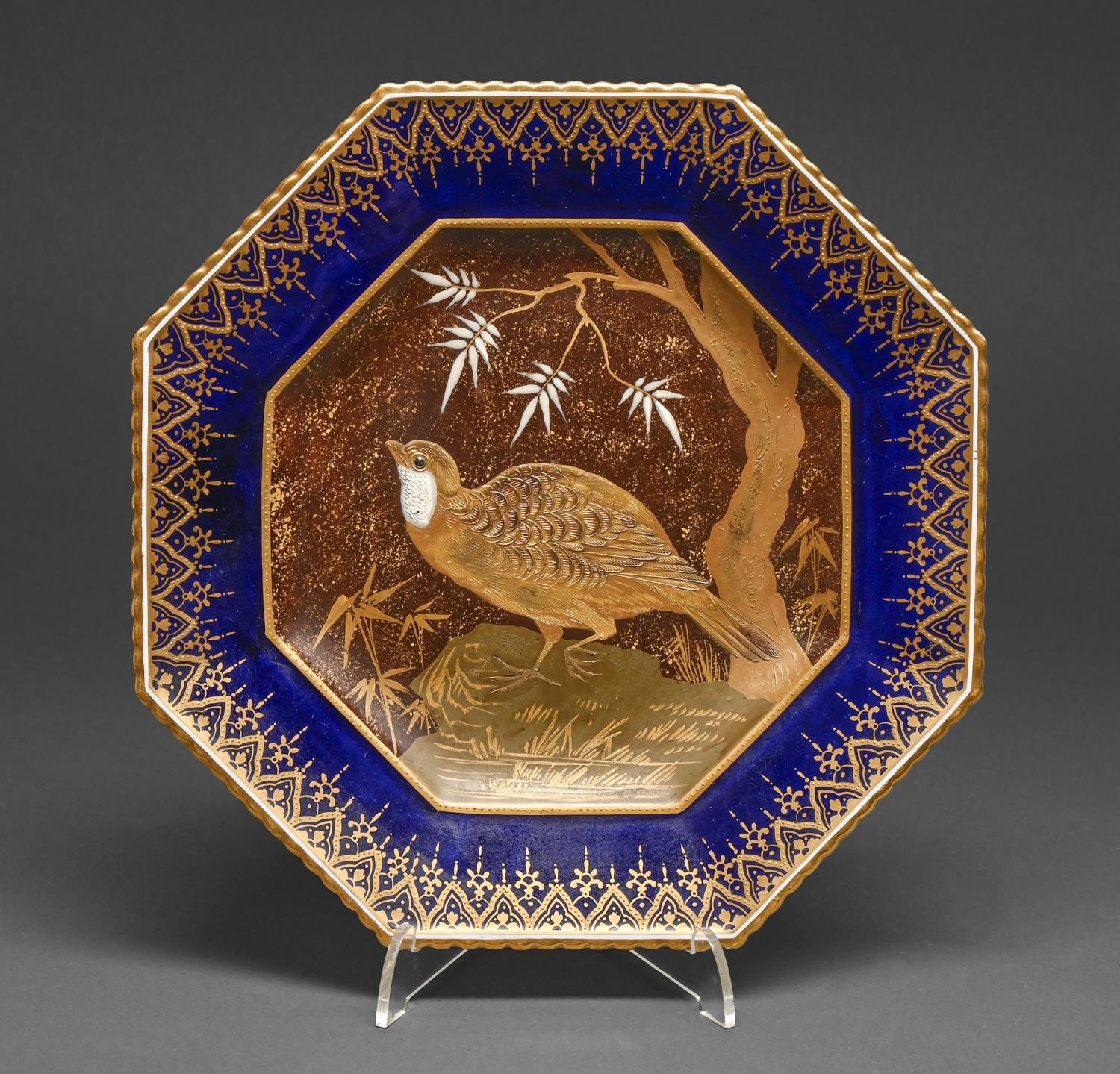 A Copeland bone china dessert plate, 1880s, of St George shape, the white enamel and raised gilt
