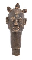 Tribal art. A West African carved wooden head, possibly Igbo Nigeria, early 20th c, 58cm h
