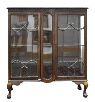 A mahogany china cabinet, c1920, with adjustable shelves, 136cm h; 37 x 121cm Good condition