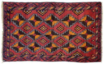 An Afghan Baluch rug, 135 x 84cm